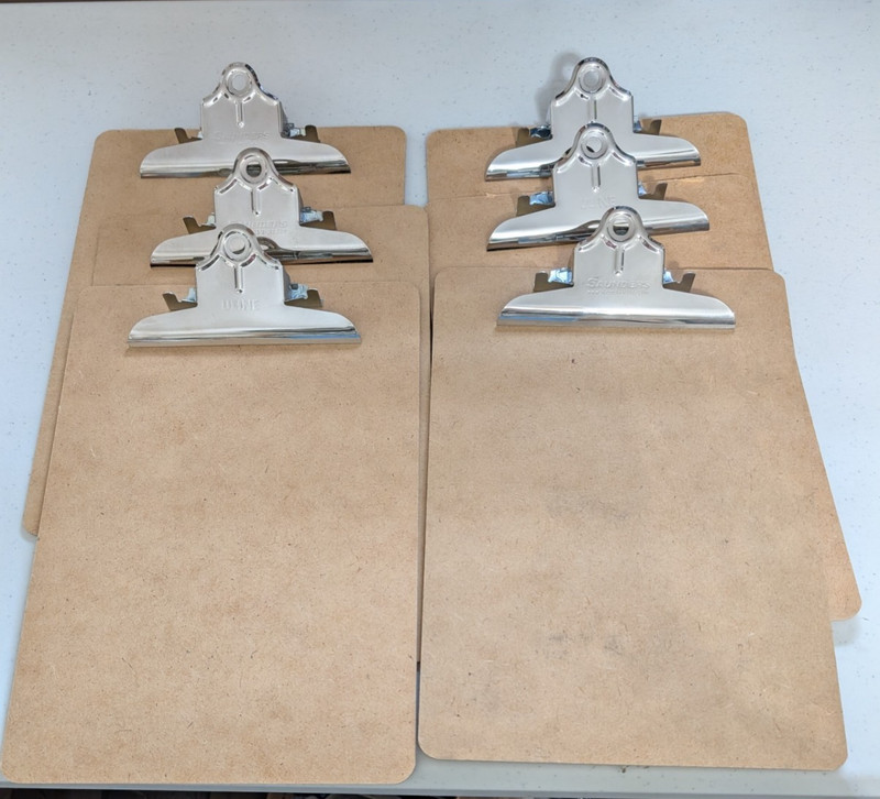 6 PACK HARDBOARD CLIPBOARDS 12.5″ X 9″ NEW OLD STYLE CLIPS SAUNDERS NOS MICHIGAN