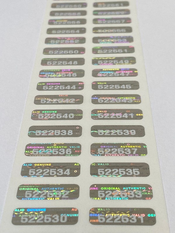 100 SMALL NUMBERED SECURITY HOLOGRAM LABELS STICKERS .75 X .25 INCH-WHITE PRINT